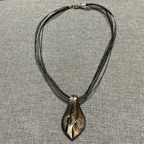 18 inch black necklace with black, gold and silver pendant - Picture 1 of 3